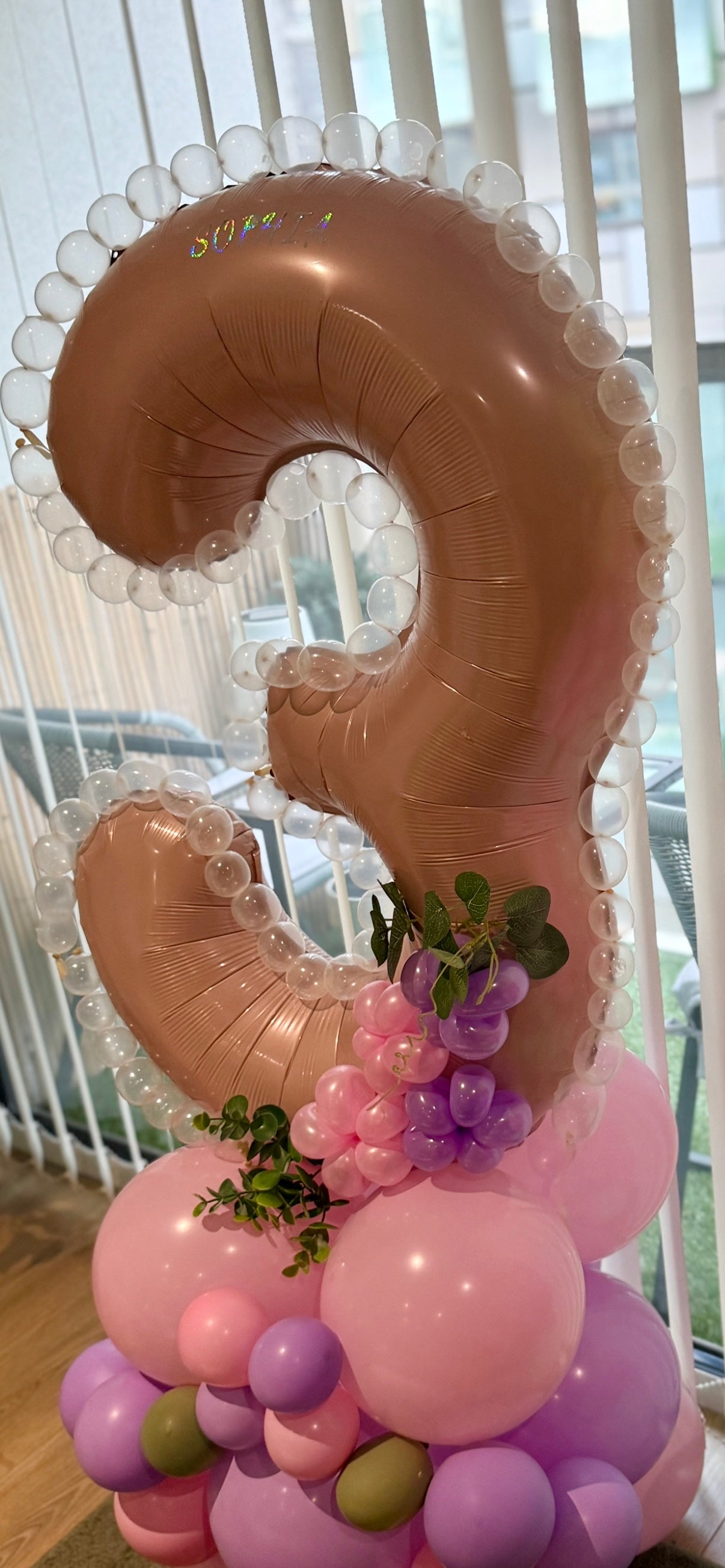 Number stack with garland